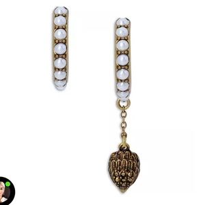 Kurt Geiger London - pearl mismatched eagle head earrings